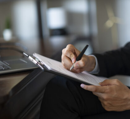 unknown businessman prepares official document